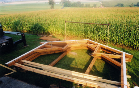Assembled bents for project stacked on the ground at site, ready to be set into place.