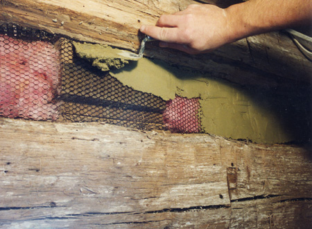 Detail plaster applied over metal lathe, fiberglass insulation.
