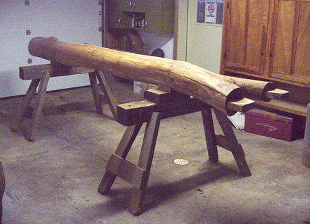 A hand finished treepost on horses.