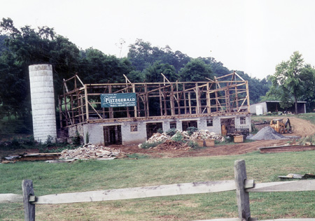 From this view, this school-building-to-be is clearly getting down to basics: stripping down to the original timber frame.