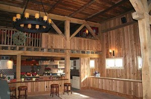 This 20th century dairy barn conversion for recreational use required the repair of the existing timber frame and the construction of significant additional timber framing. 