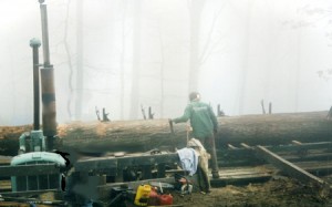 Sawyer Dean Fitzgerald takes a first pass at a good sized red oak log.