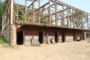 The structure was stripped to its skeleton, as the pine siding was planed to remove the paint and reinstalled inside the barn. New poplar siding was installed outside and a new roof system was built.