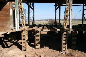 Barn Bridge Wall Removed for Reconstruction -- Barn Rests On Cribbing Stacks