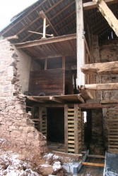 Cribbing Stacks Support Framing While Stonework Is Relaid