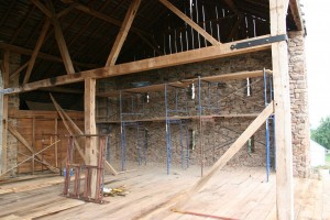 Frame Repairs and Reinforcements in Progress -- Stone Repointing Under Way
