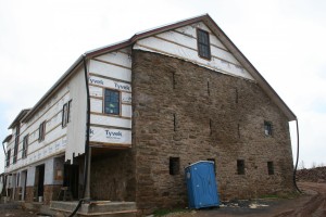 Vapor Barrier Covers SIPs and Horizontal Batten Strips Support Siding
