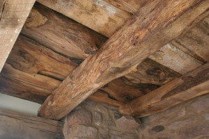 The Ceiling In the Parlor Level Still Shows the Original Log Joists and Plank Flooring
