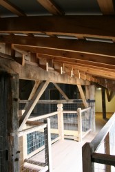 Catwalk Below New Dormer Connects Living Spaces in the New Upper Floor
