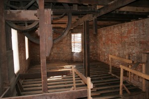 Second Floor -- Antique Elevator in Foreground Will Be Retained to Preserve Historic Character of the Building