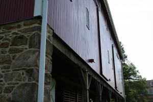 New Straw Doors, Fir Siding, and Repointed Stonework
