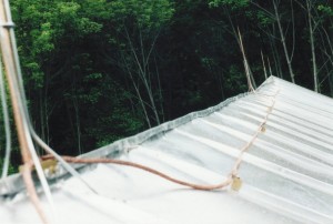 Traditional Standing Seam Roof With Lightning Suppression System -- Variations In the Antique Framing Give A Very Organic Feel