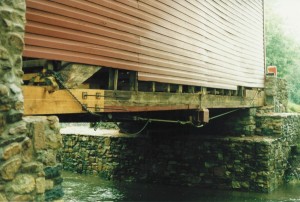Two New Lower Chord Ends Installed -- Note Chain Rigging Passing Beneath Transverse Beam