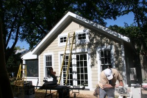 Cement-fiber board siding and trim will help this building resist the elements for a very long time.