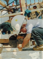 Young Dillon, helping nail flooring at the Malabar Farm raising in Lucas, OH, circa 1994.