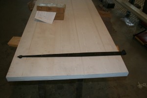 A door such as this could only be hung on hand-forged strap hinges.