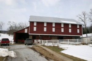 The barn as it appeared in February of 2010.  Its outwardly sound appearance hid considerable frame deterioration.