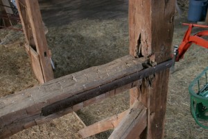 Generations of old repairs show that some damage has been present for a long time.
