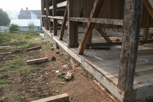 New sill timbers installed, braces spliced, flooring complete.