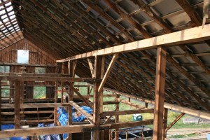 Partition plates replaced and roof straightened.