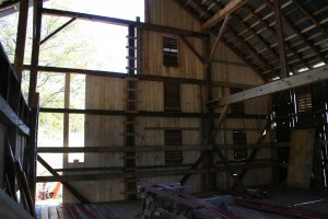 Original louvers are reinstalled in the new siding.