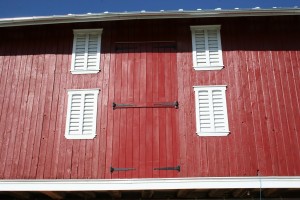 New straw doors above the forebay.  Siding on this side is original.