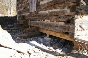 Beginning sill log replacements and foundation repairs.
