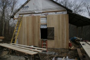 Most log homes were eventually covered with siding to protect the log structure from the ravages of weather.  Replacing that siding, or installing it where it never existed, is the best way to preserve a log building.