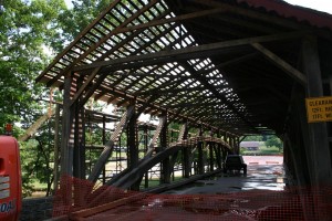All downstream side roofing and siding removed.