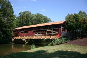 Roof nearly complete -- new siding in progress.
