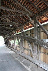 Interior view of east truss showing new poplar siding and underside of cedar roof.